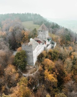 Aerial view of Hohenklingen Castle above Stein am Rhein on a foggy autumn day, Canton Schaffhausen,