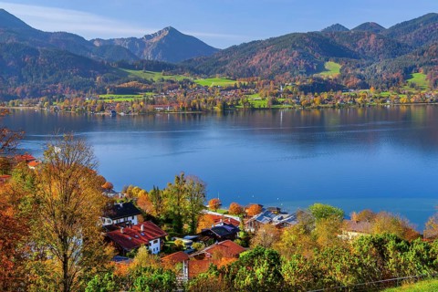 Panorama of town and lake with view to the lakeshore of Bad Wiessee in autumn, town Tegernsee,