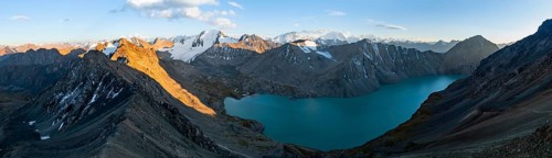 Evening mood, mountain panorama, aerial view, 4000 metre peak with glacier, mountain pass and