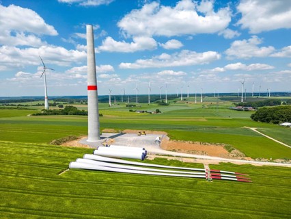 Wind farm near Brilon-Radlinghausen, new wind turbine being built, tower elements and rotors ready