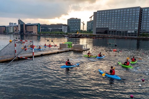 Summer evening in Copenhagen, at the harbour, Islands Brygge, people celebrating, eating, drinking,