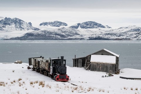 Historic mine railway in winter landscape, Kongsfjord, Ny-Ålesund, Spitsbergen Island, Svalbard and