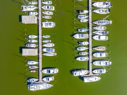 Aerial view, drone photo: Yachts on the jetty in Krummin natural harbour, Krumminer Wiek on the