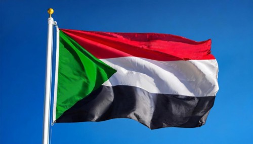 Flags, the national flag of Sudan flutters in the wind
