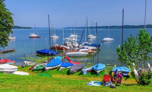 Bathing area on the lakeshore with sailing boats, Seeshaupt, Lake Starnberg, Bavarian Alpine