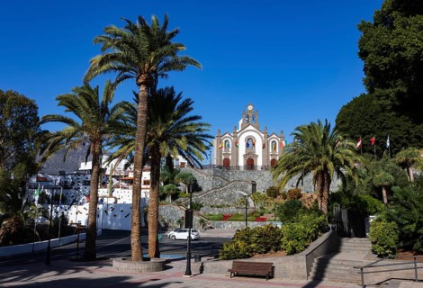 Village square with palm trees and church in Santa Lucía de Tirajana, Gran Canaria, Canary Islands,