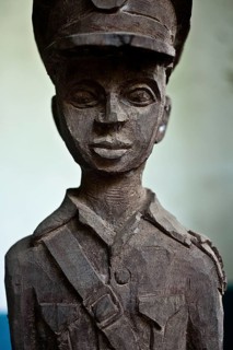 Old wooden statuette representing a colonial officer Gambia
