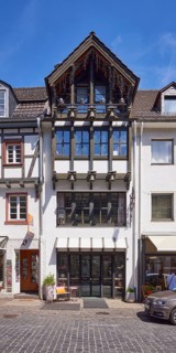 Bells on a house on Marktstraße in Bad Münstereifel, Eifel, Euskirchen district, North