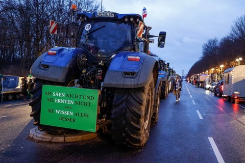 Thousands of farmers demonstrate with their tractors against the planned cancellation of the