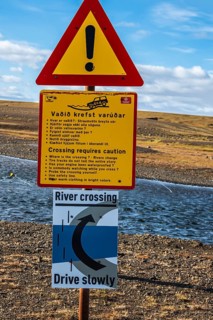 Warning notice at a ford, river crossing on mountain road F206, road to Laki crater or Lakagígar,
