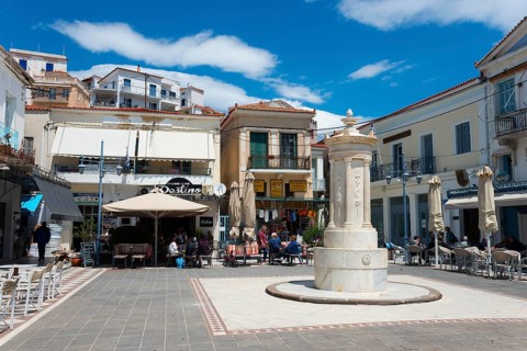 Lively square with a central fountain, surrounded by cafés and historic buildings, Old Fountain,