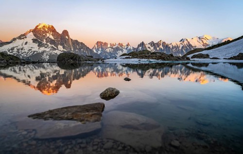 Evening mood, mountain landscape at sunset, alpenglow, water reflection in Lac Blanc, mountain
