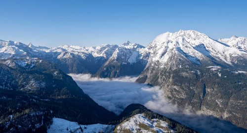 View of sea of clouds and snow-covered mountains, mountain panorama with Watzmann, from the Jenner,
