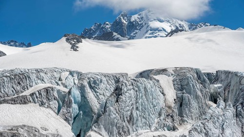 High alpine mountain landscape, Glacier du Tour, glacier with crevasses and mountain peak, summit