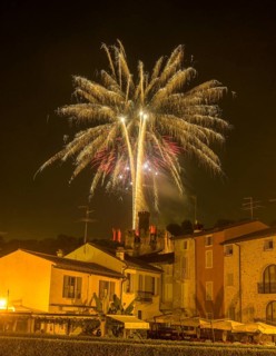 Fireworks from the Scaliger castle in the foreground Houses of, Borghetto, Valeggio sul Mincio,
