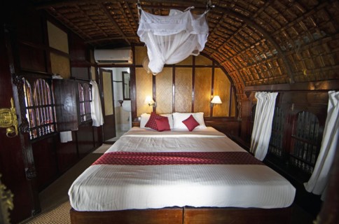 Sleeping cabin of a traditional houseboat on Lake Vembanad, canal system of the backwaters, Kerala,