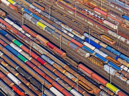 Deutsche Bahn AG marshalling yard. Many goods trains are parked on the tracks with tank wagons, car