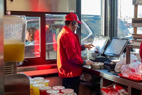 Sterling Heights, Michigan, Workers serve up Chickenjoy fried chicken at Jollibee, a Filipino fast
