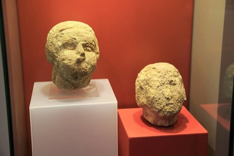Ggantija temples visitor centre display museum, Gozo, Malta stone human heads faces