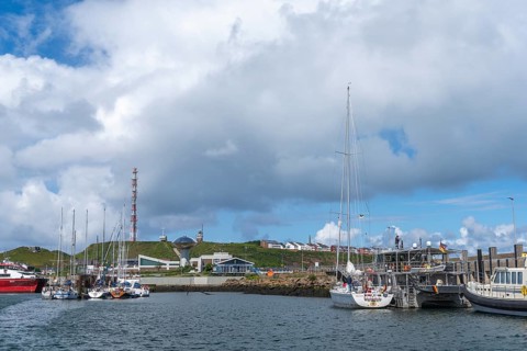 View from south-east to harbour facilities, Unterland and Oberland, offshore island Helgoland, blue