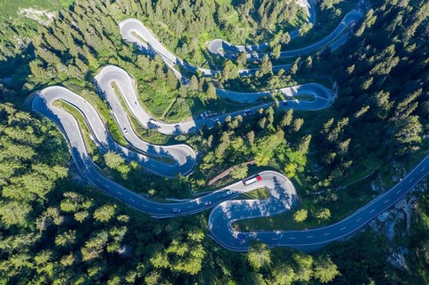 Curves of Majola mountain pass, drone shot, Switzerland, Europe