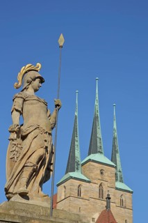 Minerva fountain and church tower of the UNESCO Gothic Church of St Severus, sculpture of Minerva