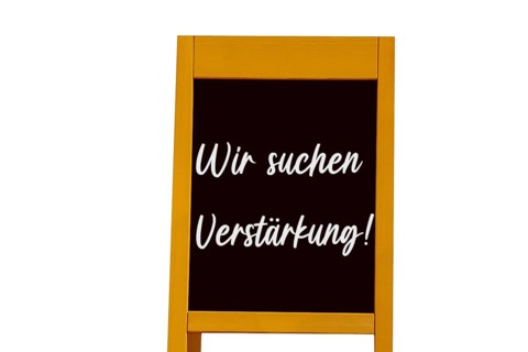 Display with the inscription We are looking for reinforcement against a white background