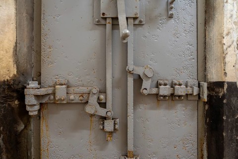 Locking mechanism on gas-tight steel armoured door inside Fort van Liezele, fortress of the