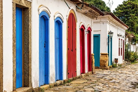 Facade of old houses in colonial architecture with their colorful doors, Paraty, Rio de Janeiro,