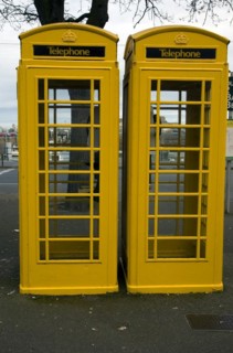 Two yellow telephone boxes, St Peter Port, Guernsey, Channel Islands, UK, Europe