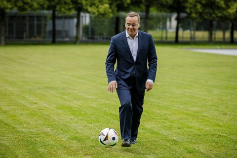 Boris Pistorius (SPD), Federal Minister of Defence, with a football. Taken during an interview.