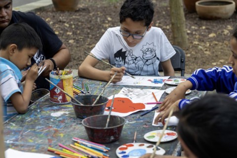 Oaxaca, Mexico, Students painting at a temporary art class in the zocalo, Central America