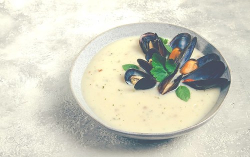 Chowder cream soup with mussels, American cuisine, homemade, no people