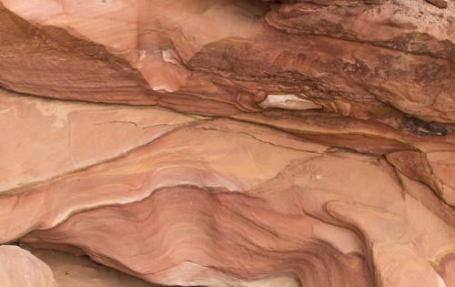 Natural texture of red rocks. Colored canyon, Egypt, desert, the Sinai Peninsula, Nuweiba, Dahab,