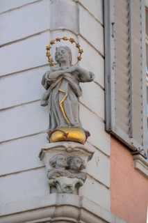 Sculpture of the Virgin Mary on a corner house, Endingen, Baden-Württemberg, Germany, Europe