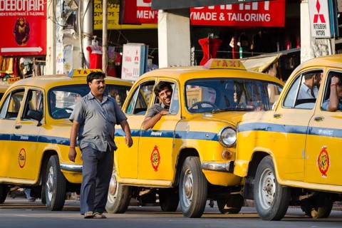 Laughing taxi drivers and taxis, Calcutta or Kolkata, West Bengal, East India, India, Asia