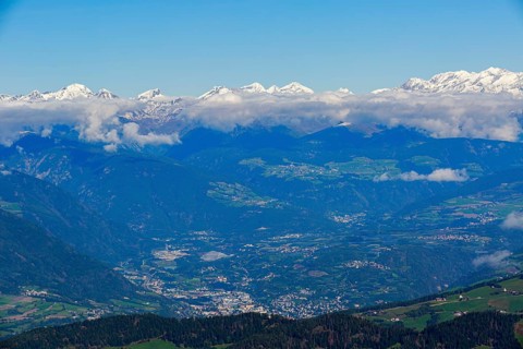 Panoramic view of Ortisei, surrounded by mountains, under a cloud cover, Val Gardena, South Tyrol,