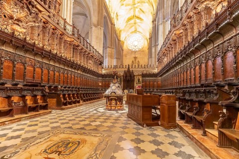 Magnificent Gothic church with richly decorated wood carvings and numerous seats, Seville
