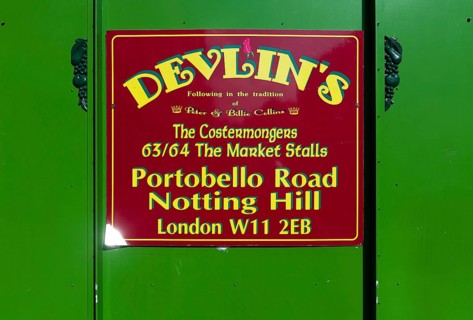 Sign for fruit and vegetable shop Devlin's, Portobello Road, Notting Hill, London, England, Great