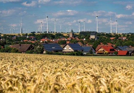 Wind farm near the East Westphalian town of Energiestadt Lichtenau, many residential buildings with