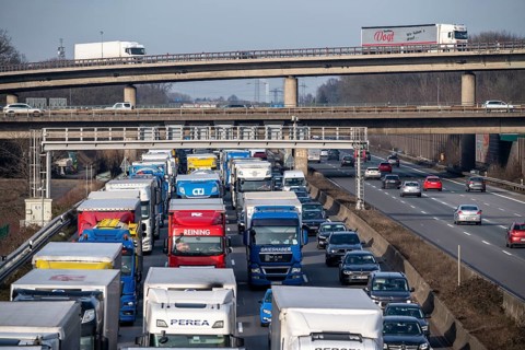 Traffic jam on the A3 motorway, at the Köln-Ost junction, heading south, four lanes jammed with