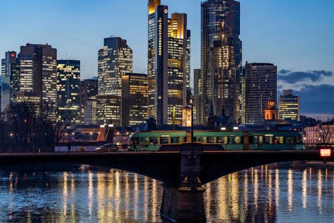 Skyline of the city centre of Frankfurt am Main, river Main, dusk, Ignatz-Bubis-Brücke, Hesse,