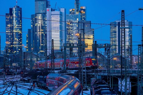 Railway tracks in front of the main railway station in Frankfurt am Main, skyline of skyscrapers in