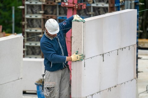 Bricklaying work, construction site, new construction of apartment blocks, shell construction,