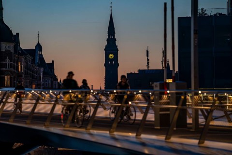 Cyclists on the Lille Langebro cycle and pedestrian bridge over the harbour, Copenhagen is