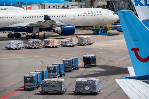 Amsterdam Airport Schiphol, aircraft at terminal, Gates D, check-in, apron, loading of air freight,