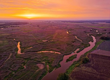 Sunrise over the meandering riverbed of the Narew and the Narew National Park, Narwianski Park