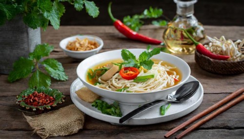 Food, a plate of chicken soup with ramen, Japanese noodles on a wooden table, AI generated, AI
