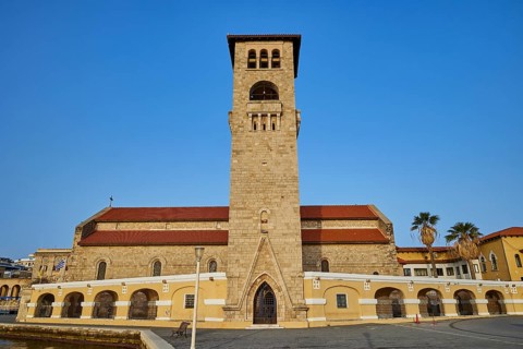 A church with bell tower and arcades under a blue sky, Church of the Annunciation of the Blessed