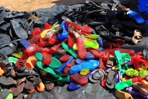 South Ethiopia, market in Jinka, market day, trade with plastic sandals, plastic shoes, market